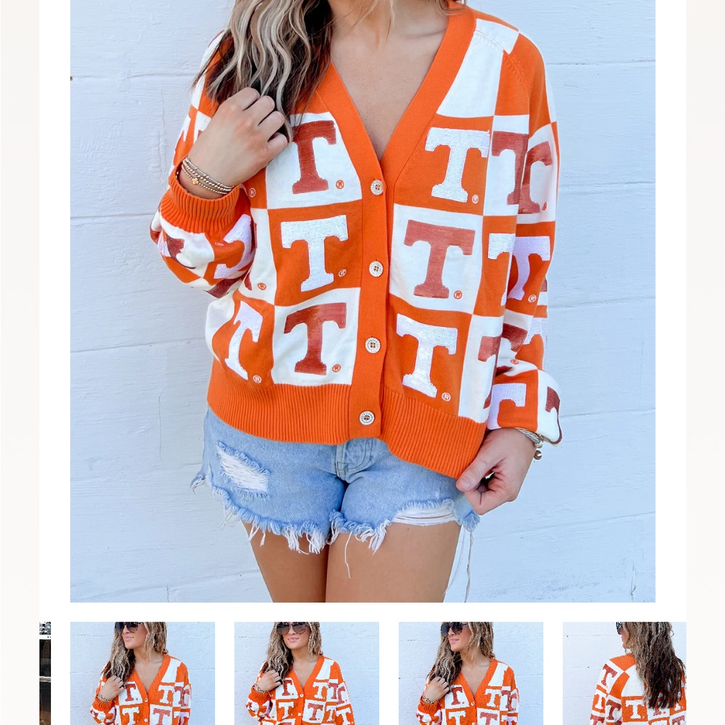 Queen Of Sparkles Orange And White Sweater